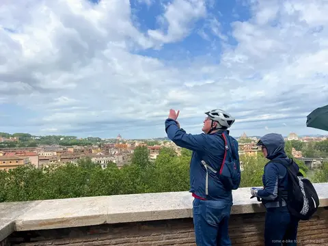 E-bike rider overlooking Rome from the Orange Garden on the Aventine Hill