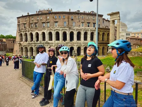 Small group of riders on Trek e-bikes near the Trevi Fountain in Rome